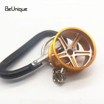 

2017 Unique Golden wheel hub design Auto part Keychain pendant luxury Car keyring Automotive Gifts climbing hook llaveros hombre