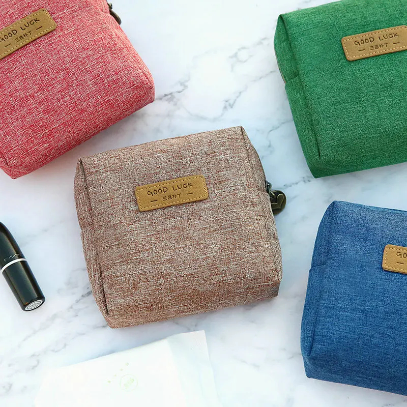 

portable bag to receive bag is natural cosmetic bag girl solid small bag contracted capacity Sanitary napkin to receive package