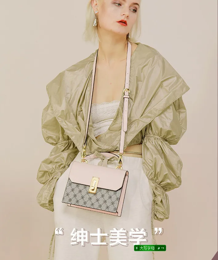 

3 Trend hit color handbag 2019 new female bag exquisite lock hit color stitching shoulder 190628 yx