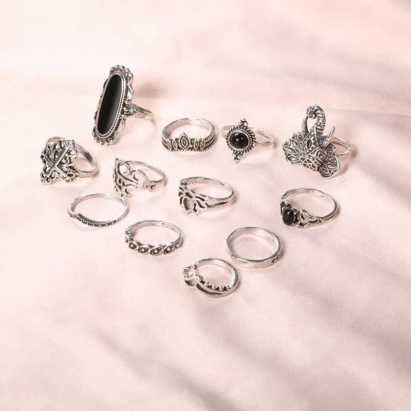 

New European And American Personality Hollow Lotus Elephant Crown Black