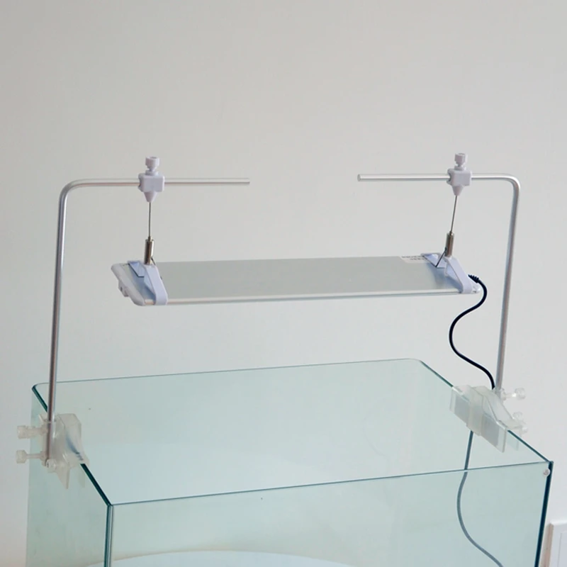 

2 pcs of high quality aluminium alloy fish tank lamp hangers with 2 pcs of acrylic adjustable lamp clamps for aquarium