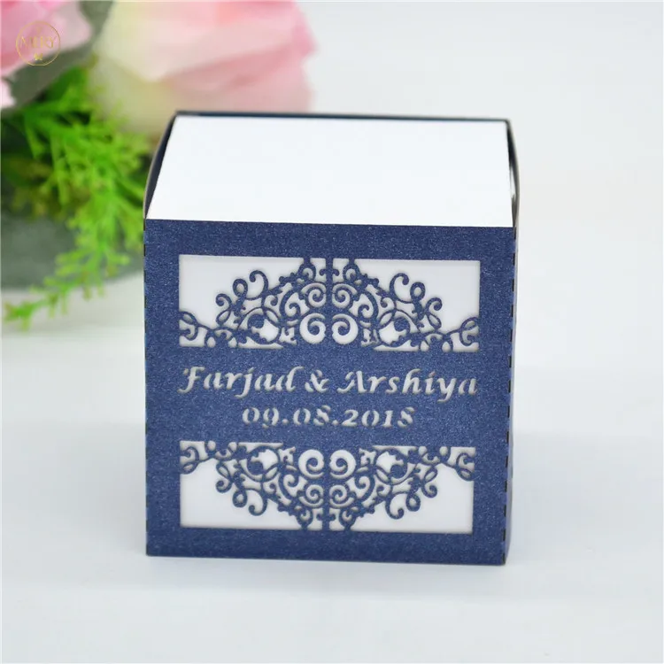 

Unique white wedding favor box with navy laser cut cover