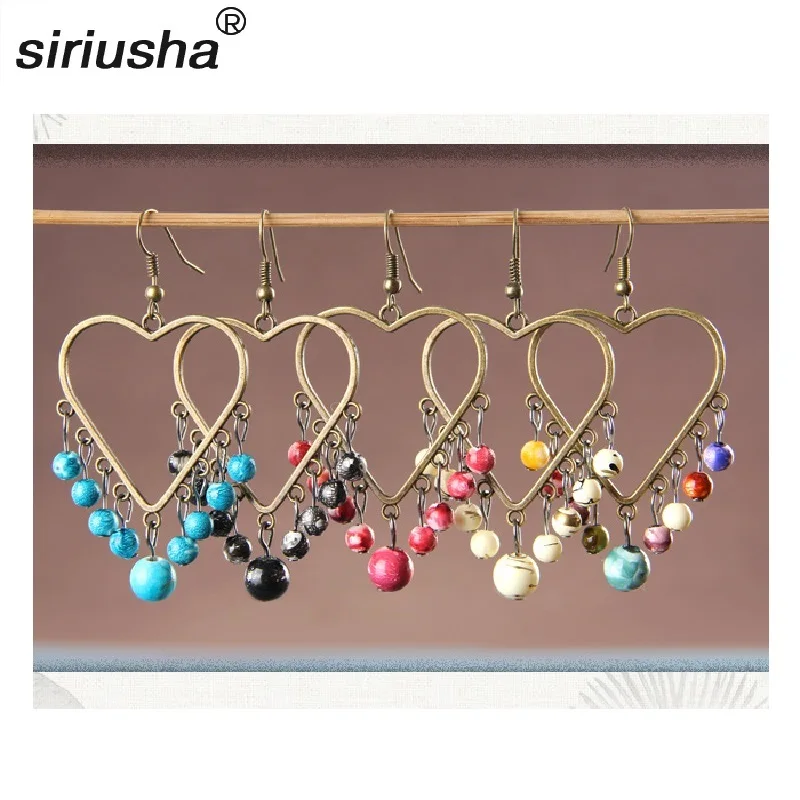 

Retro Exaggerated Atmospheric Women's Heart Heart Earrings National Wind Color Beizhu Bronze Earrings Cheap Earrings S280