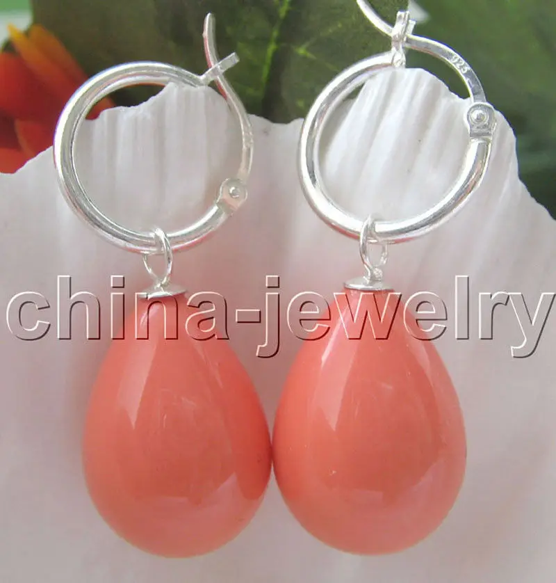 

Selling >Beautiful 12-16mm orange drip sea shell pearl earring - silver
