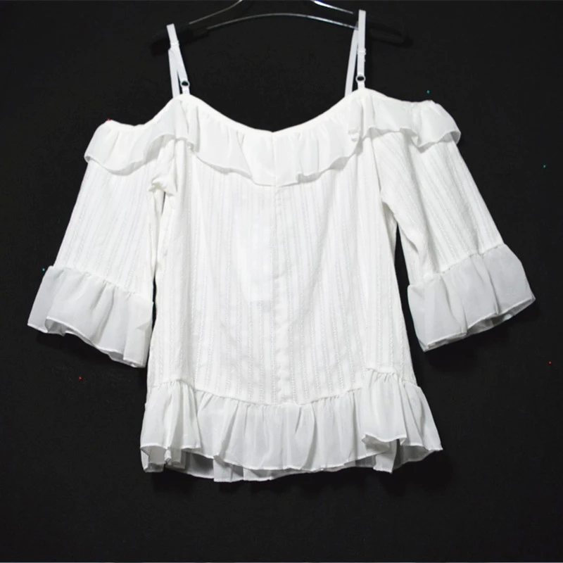 white frilly blouse