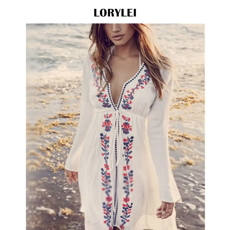 white embroidered beach cover up
