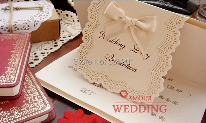 

wedding invitation card -- customised printing luxury marriage Paper Card laser cut type cards with a ribbon 100pcs/lot