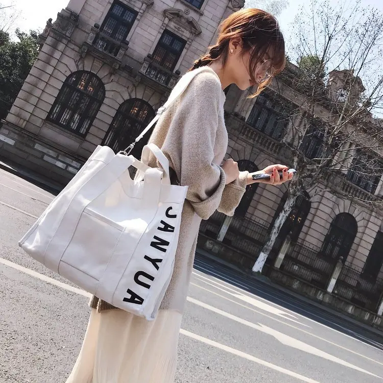 

New simple all match letter canvas bag female shoulder Messenger bag student large capacity handbag black white crossbody bag