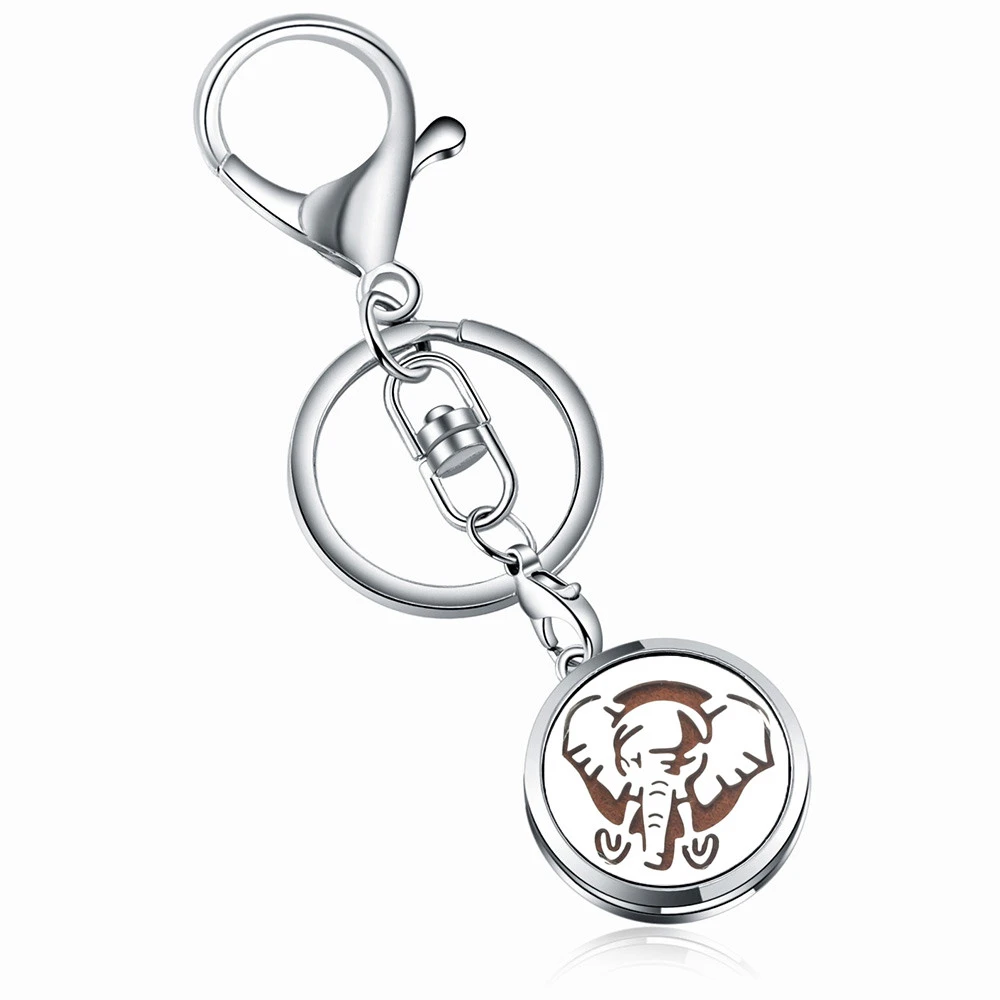 

Fashion Elephant Aromatherapy Box KeyChain Stainless Steel Perfume Essential Oil Diffuser Scent Key Chain Keyring Christmas Gift
