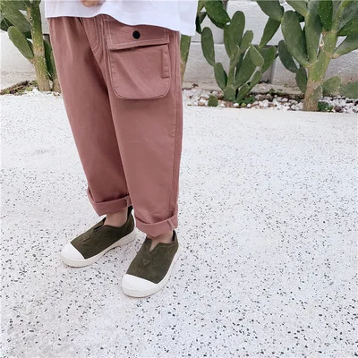 

Spring new children's casual pants boys and girls baby three-dimensional pockets full cotton pants