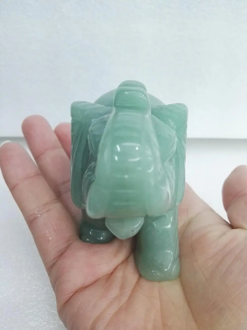 Hand carved natural green Tanglin jade elephant ornamentsin Statues