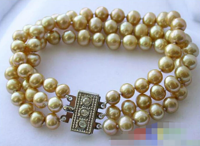 

0827 3ROW champagne ROUND FRESHWATER PEARL BRACELET