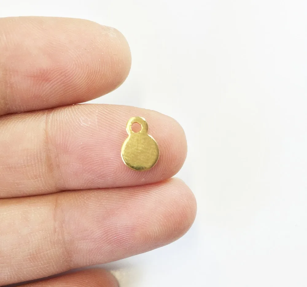 

Eruifa 20pcs 7mm Iron Finding Dangling Round DIY Charms Pendant silver and Gold Jewelry handmade DIY 2 colors