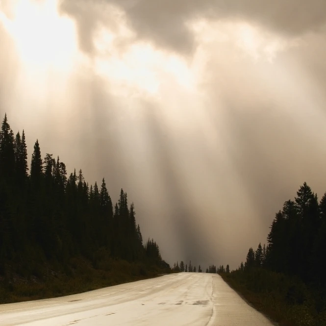 Sun Breaking Through Clouds Jasper National Park Alberta Poster Print (34 x 22)