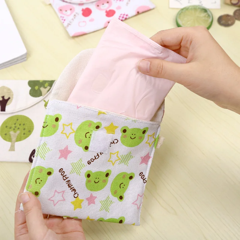 Luluhut الكرتون لطيف تصميم الإناث النظافة المناديل الصحية حقيبة التخزين فوط صحية حقيبة جيد هدية لفتاة حجم 13*12 cm