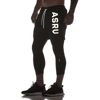 

2019 new sports pants men's quick-drying nine pants outdoor running European and American fitness pants