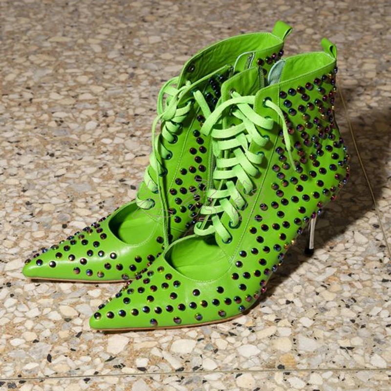 green cross ankle boots