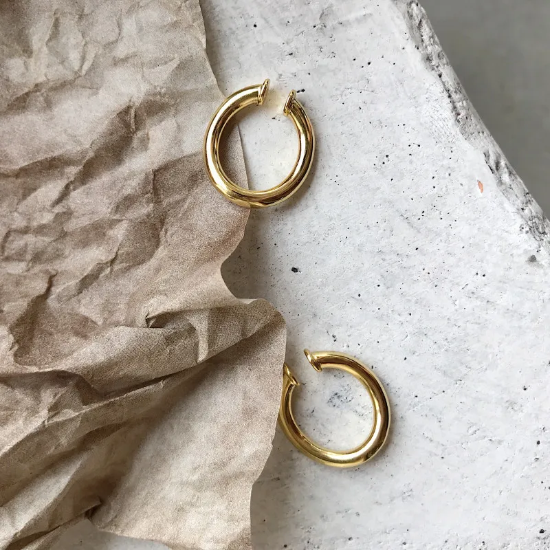 

Silvology 925 Sterling Silver Two Use Clip Earrings Gold Glossy Geometric Art Western Ear Clip for Women 925 Fashionable Jewelry