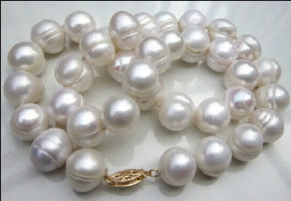 

Jewelr 004511 11-12MM AAA NATURAL WHITE SOUTH SEA BAROQUE PEARL NECKLACE 14KGP
