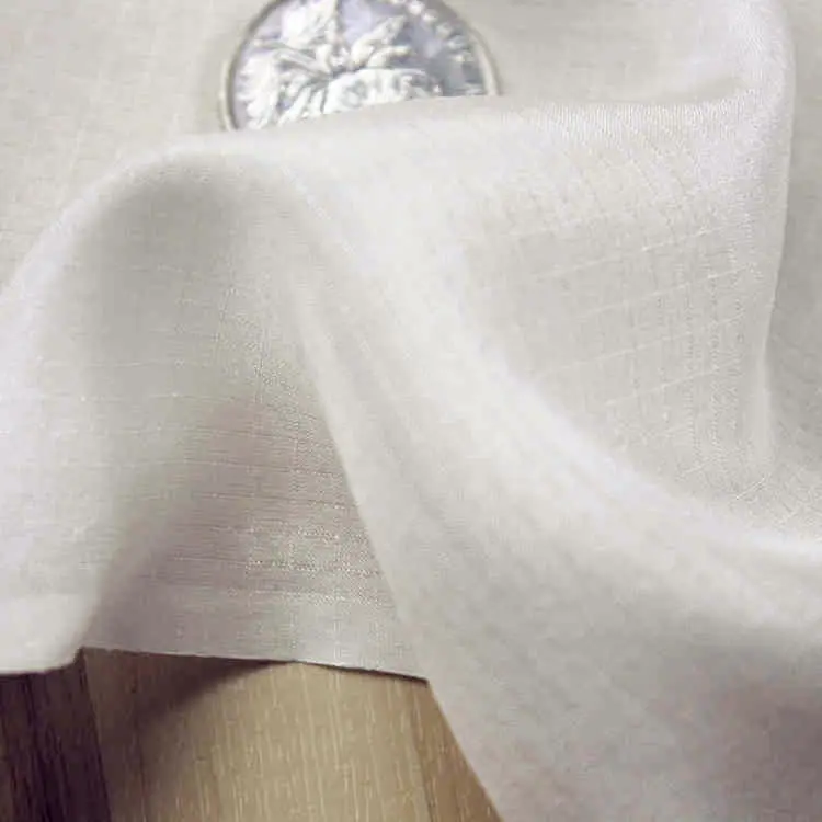 

DOBBY 100% silk fabric habotai,width:114cm,thickness:9mm,color:biege-white,sell by 3m,#1