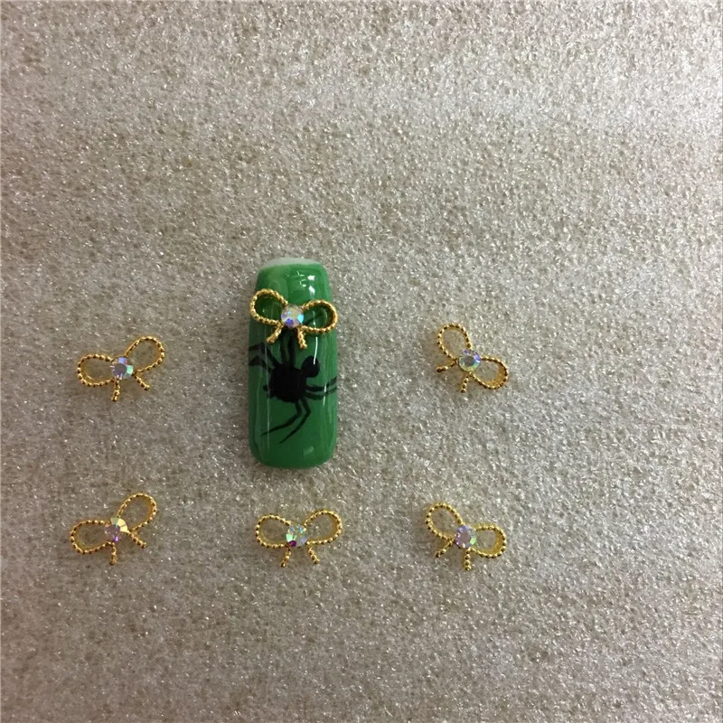 

10 Pcs/bag Nail Alloy Jewelry Golden AB Diamond Bow Shining 3D Nail Art Decoration 2017 New Style Decoracao Acessorios NO.46