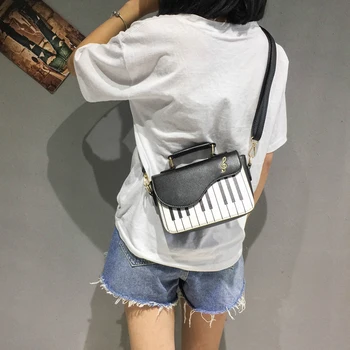

Bag female slung small new vibrating network red small black bag Korean students wild piano bag