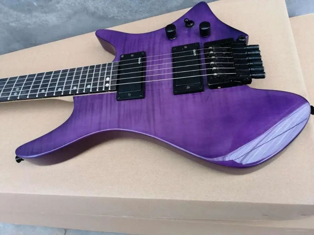 

Fans frets headless electric guitars with flame maple veneer on top