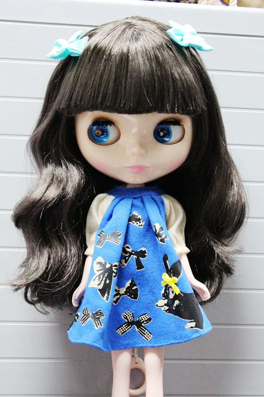 dolls with big heads and eyes