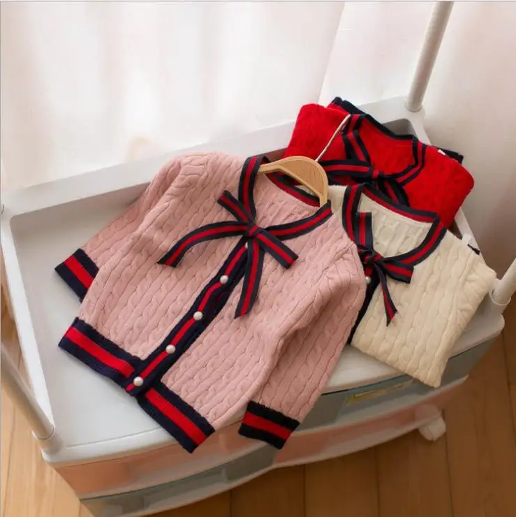 

Baby girl's warm knitted sweater