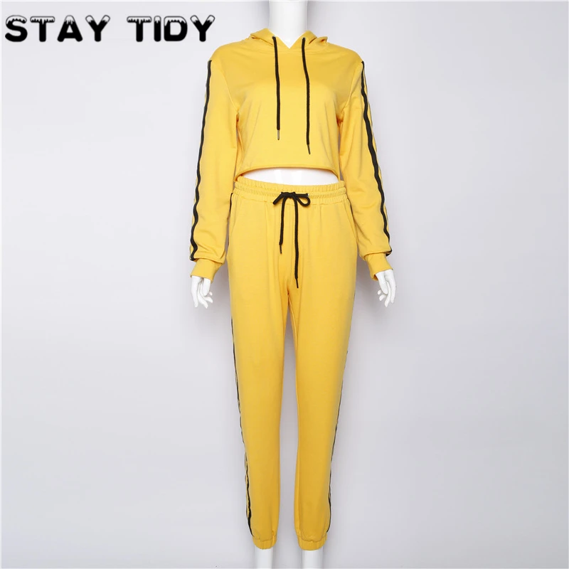 yellow and black jogging suit