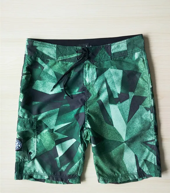 

Men's Green Print Board Shorts Size 28,32 (Faulty)