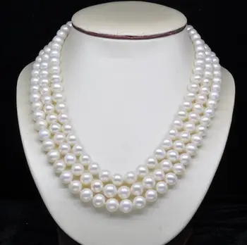 

Free shipping@@@@@ 6-7MM AA White freshwater Round Pearl Necklaces 50"