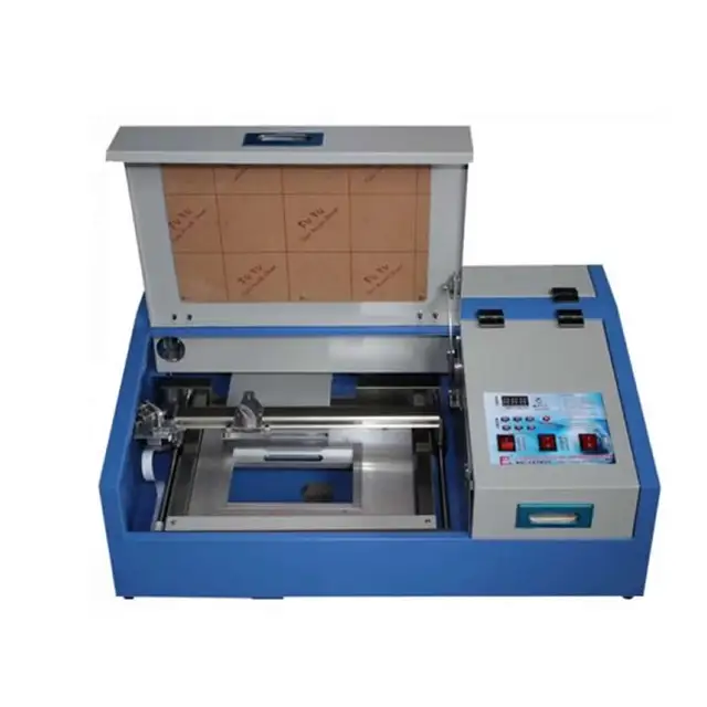 Best Price CNC laser engraveing cutting machine 3020 40w 50w computer stamp handicraft machine Best Price CNC laser engraveing cutting machine 3020 40w 50w computer stamp handicraft machine