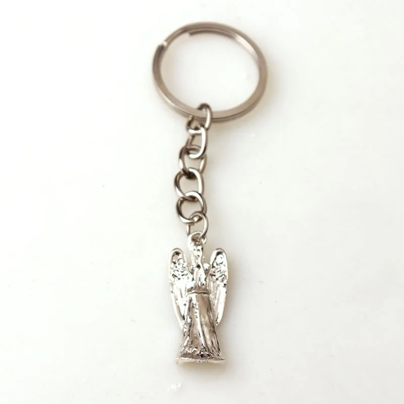 

2015 NEW DESIGN NEW BBC TV DOCTOR DR. WHO GREY WEEPING ANGEL ANGELIC 1" PENDANT KEYCHAIN GOOD PRESENT