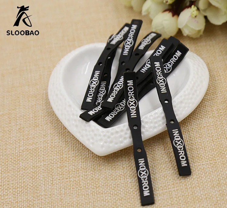 Custom rubber labels embossed logo of suede plastic labels for clothing