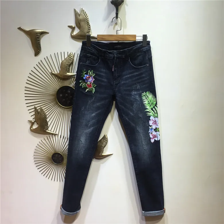 

New 2017 men's brand of jeans worn holes must be washed blue pants trousers