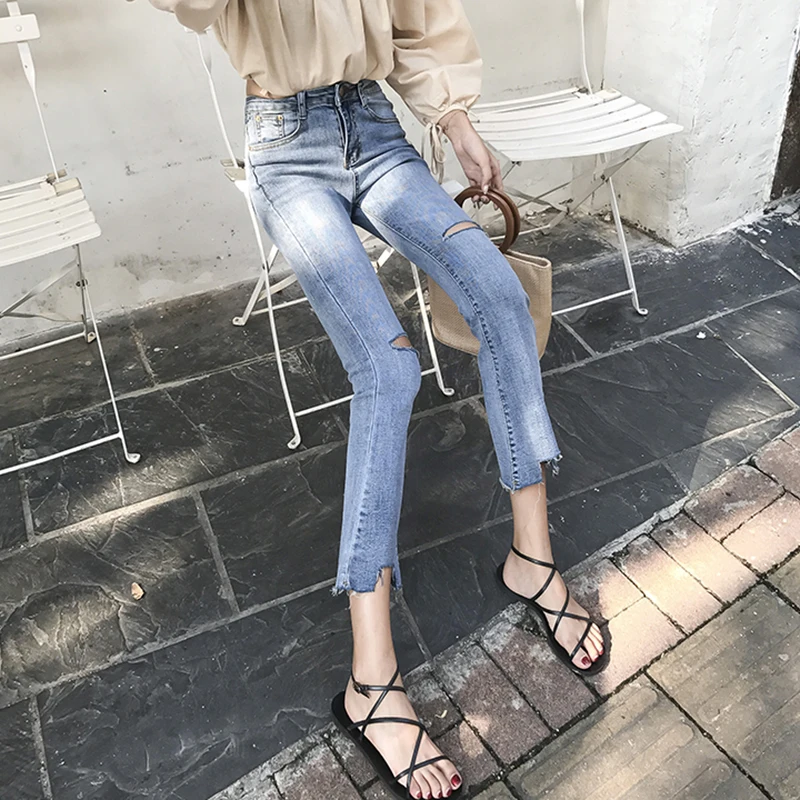 2019 modis spring summer Slim high waist sexy irregular ladies jeans Wide leg pants Korean nine bell bottom mom jeans women