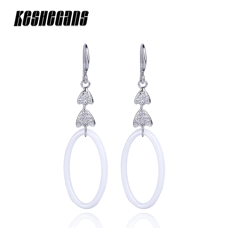 

Fashion Ceramic Earrings Double Silver Heart With White Ceramic Hollow Oval Drop Earrings Best Wedding Accessories Simple Design