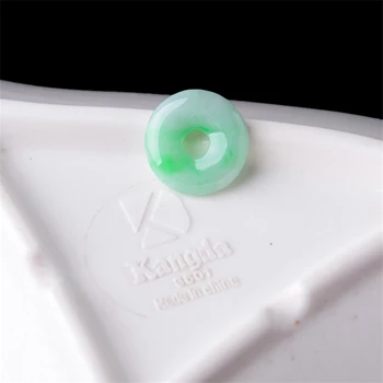 

Jade pendant peace buckle Hand carved Size 14.6*3.6 mm Accompanied by a certificate 19040819 And lanyard