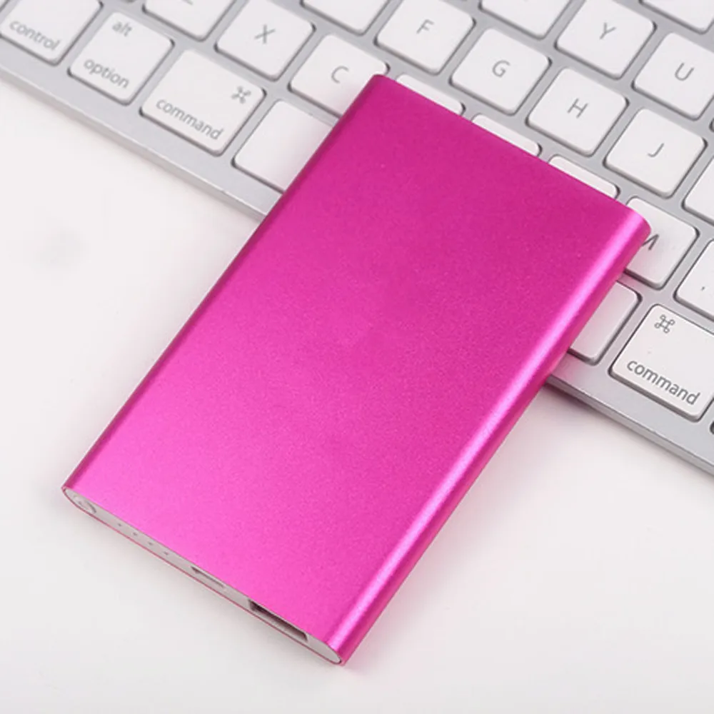 New arrival Ultrathin 12000 mAh Portable USB Battery Charger Power Bank For Iphone Smart Cell Phones Includes a charging cable