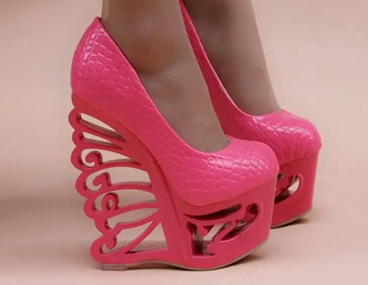 

2017 new women's shoes 15CM thick shallow bottom super-high heels rough slope and sexy nightclub unique profile.