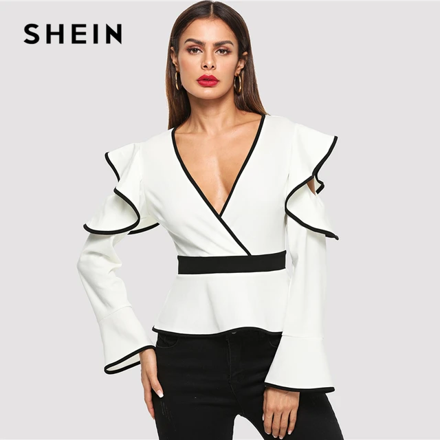 de manga larga con cierre de cremallera y manga larga con volante blanco – Dali Español