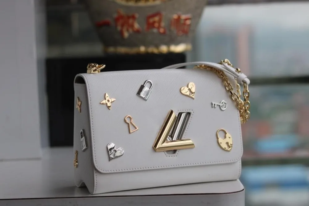 

XuXu spring bag gold and silver lock head Cowhide Trim microfiber lined with gold and silver metal sliding chain shoulder straps