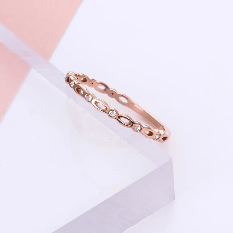 

Women Elegance Titanium Steel Rose Gold Color Hollow Out Simple Flower with Rhinestone Women Finger Rings Cheap Rings Size 8