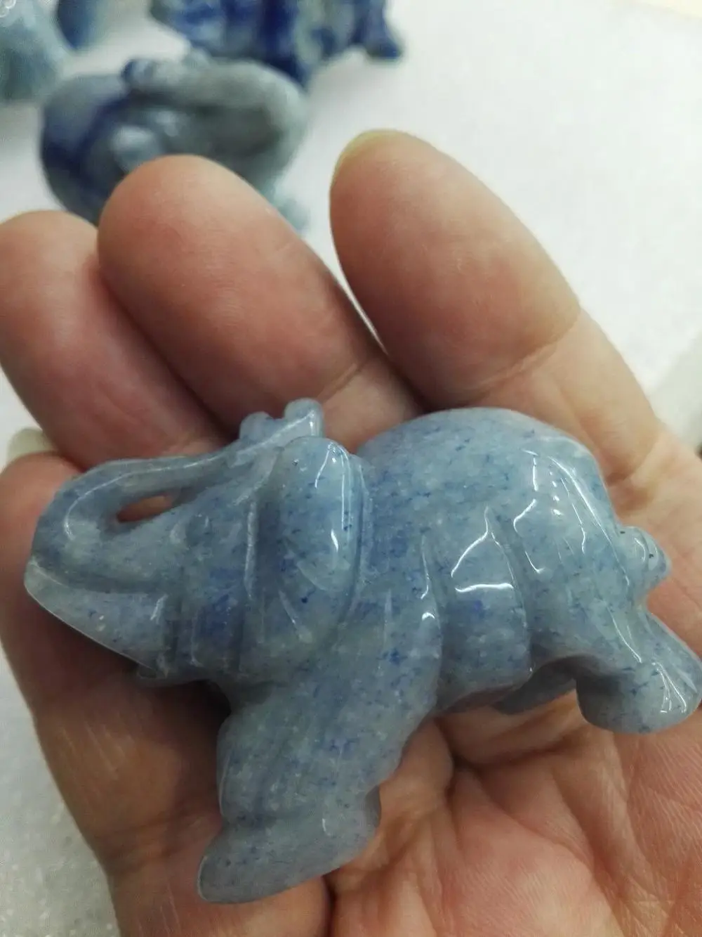 Hand carved natural blue Dongling jade elephant ornaments (random
