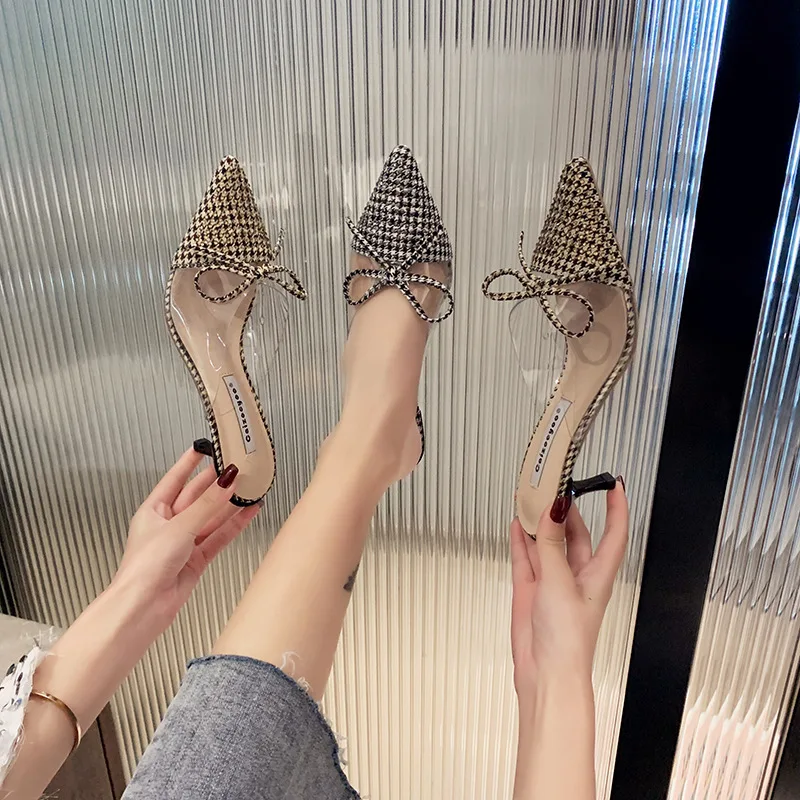

Fashion new women's slippers in the summer wearing a bow stiletto with a baotou rhinestone half slippers women