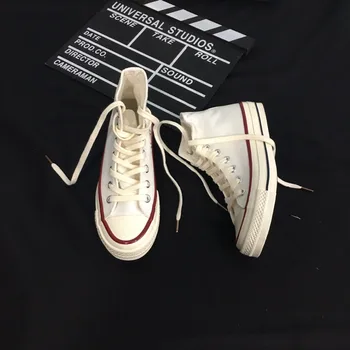 

2018 new high casual canvas shoes women's fashion simple solid color flat shoes.