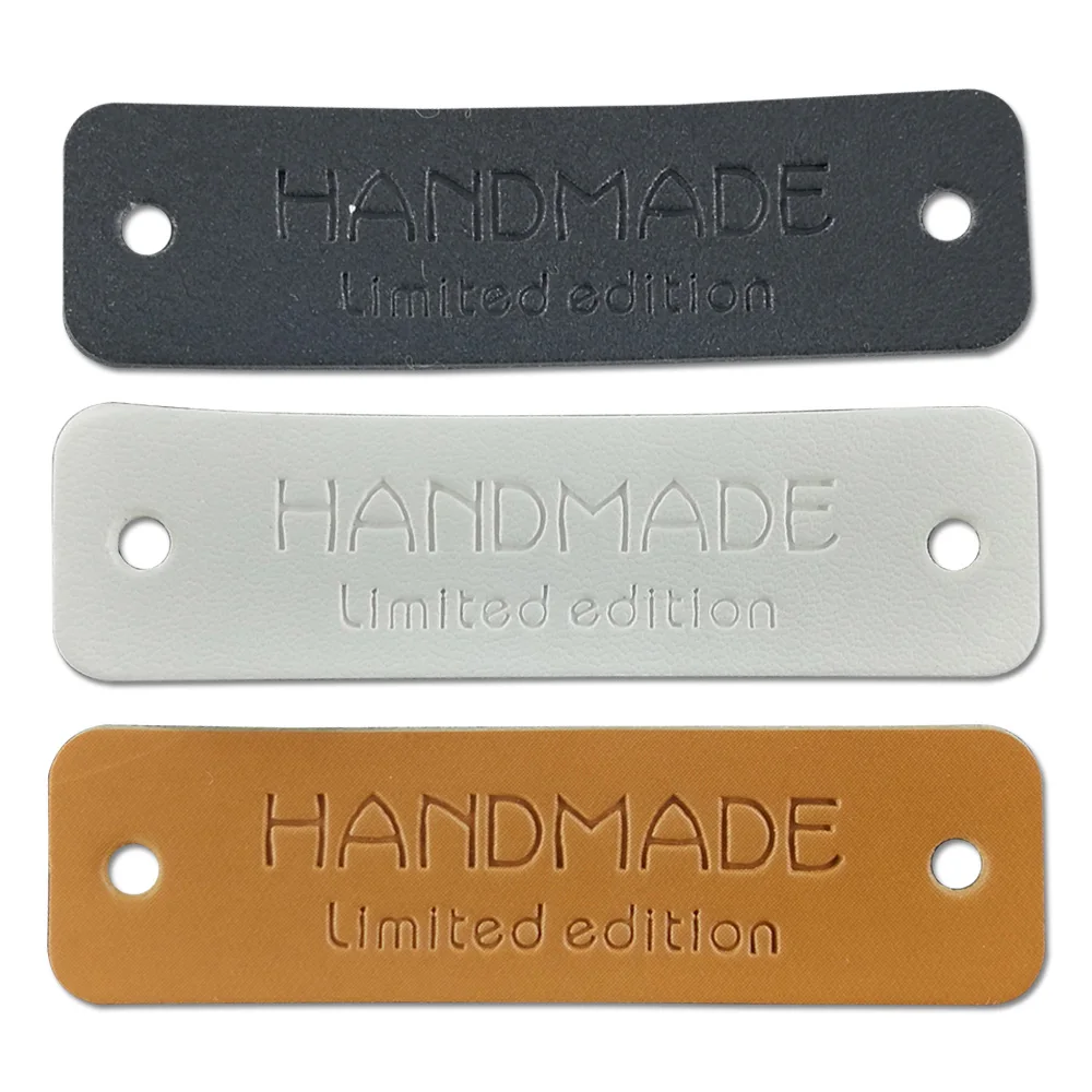 

48pcs Opalus DIY leather handmade clothing labels with Rudder logo hand work gift bag needle work tags leather skin sewing tags