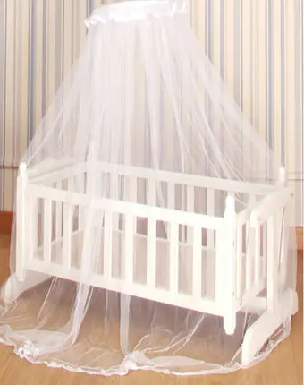 baby sleeping wooden bed