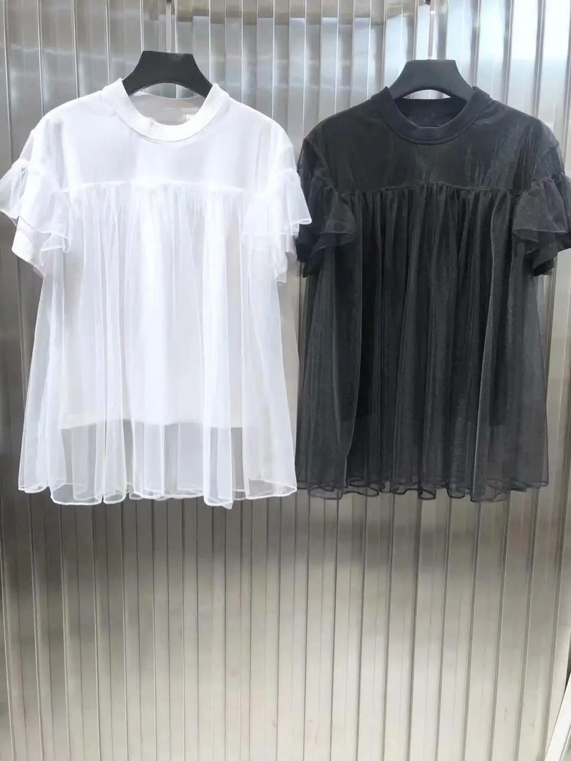 

2019 new ladies fashion short-sleeved casual mesh laminated top 0601